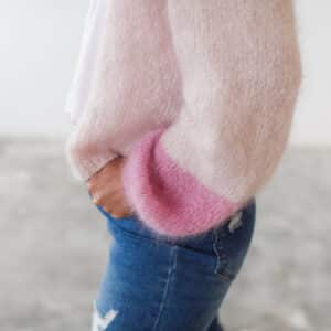 Woman standing wearing Duo Toned Cardigan